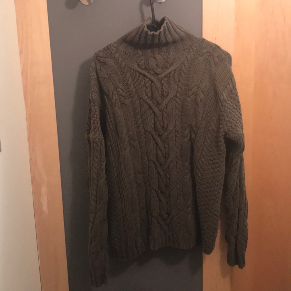 Green cable sweater